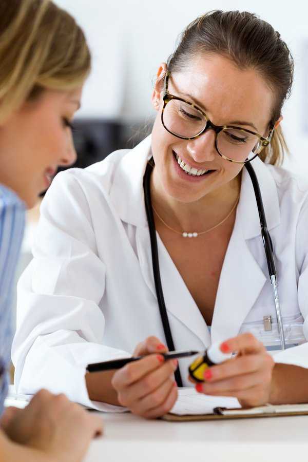 Doctor talking to patient